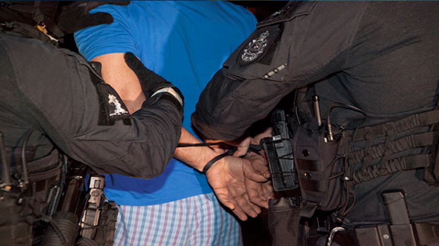 arrestee in handcuffs